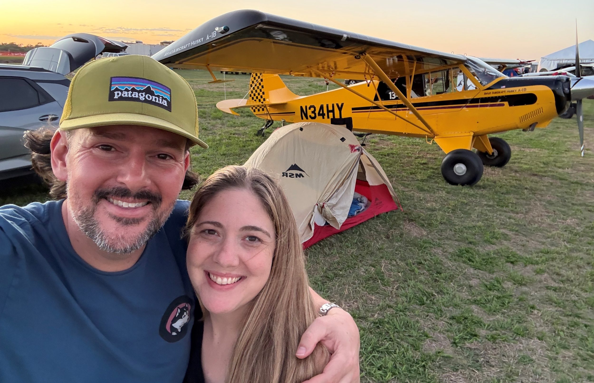 Chad and Laciana Hall, founders of Music City STOL, camped under the wing of their Aviat Husky