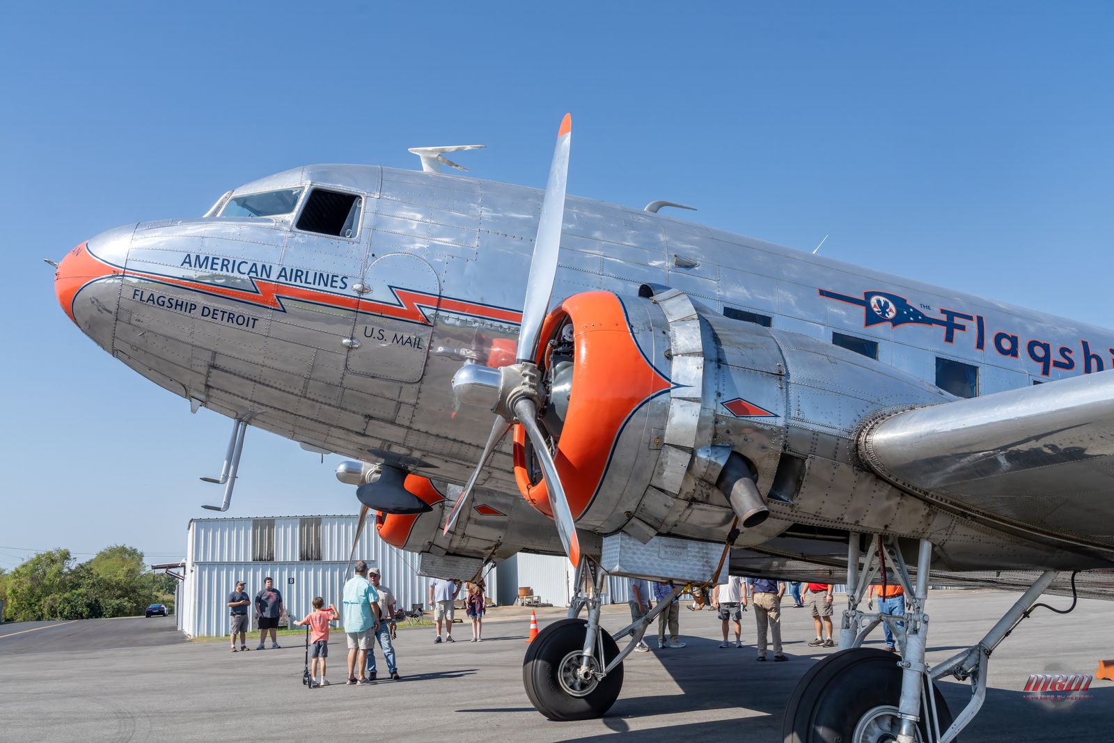 Spectators strolling around the vintage DC-3