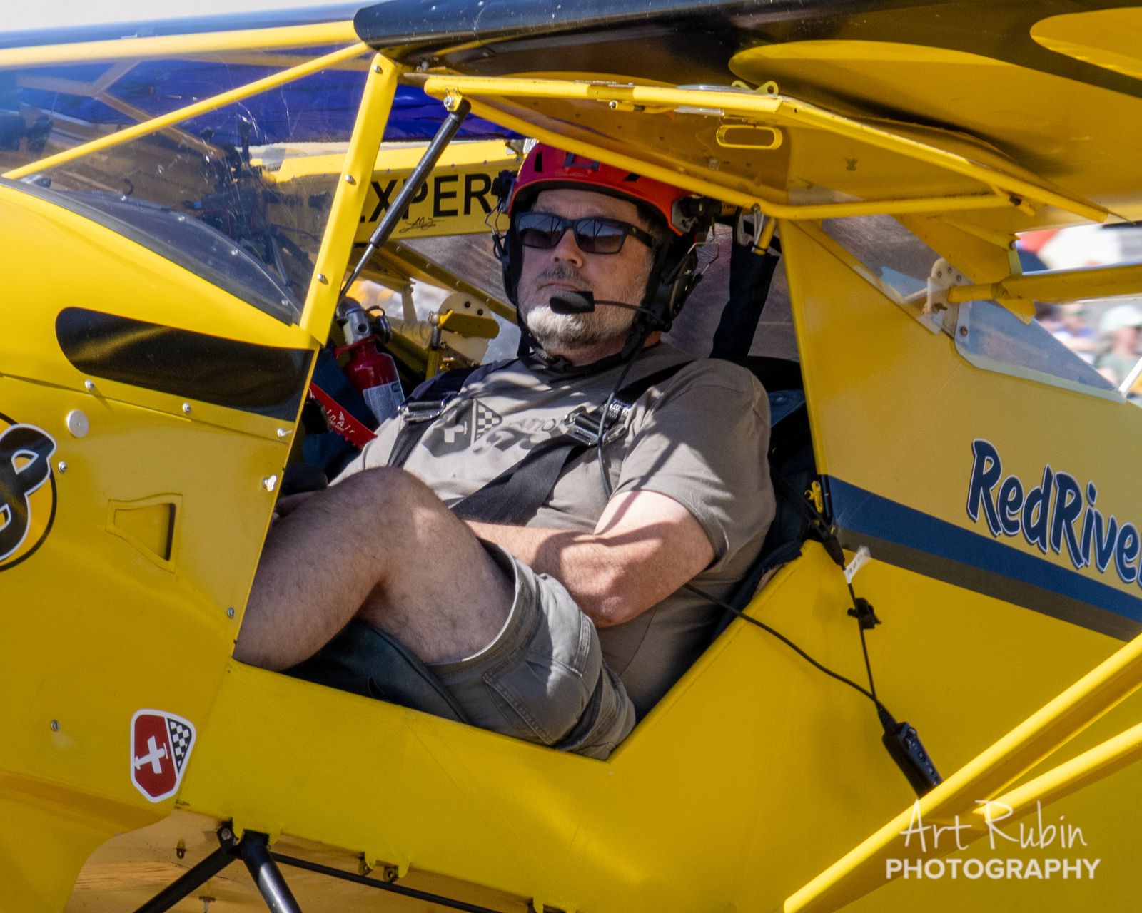 A competitor relaxed in the cockpit between runs