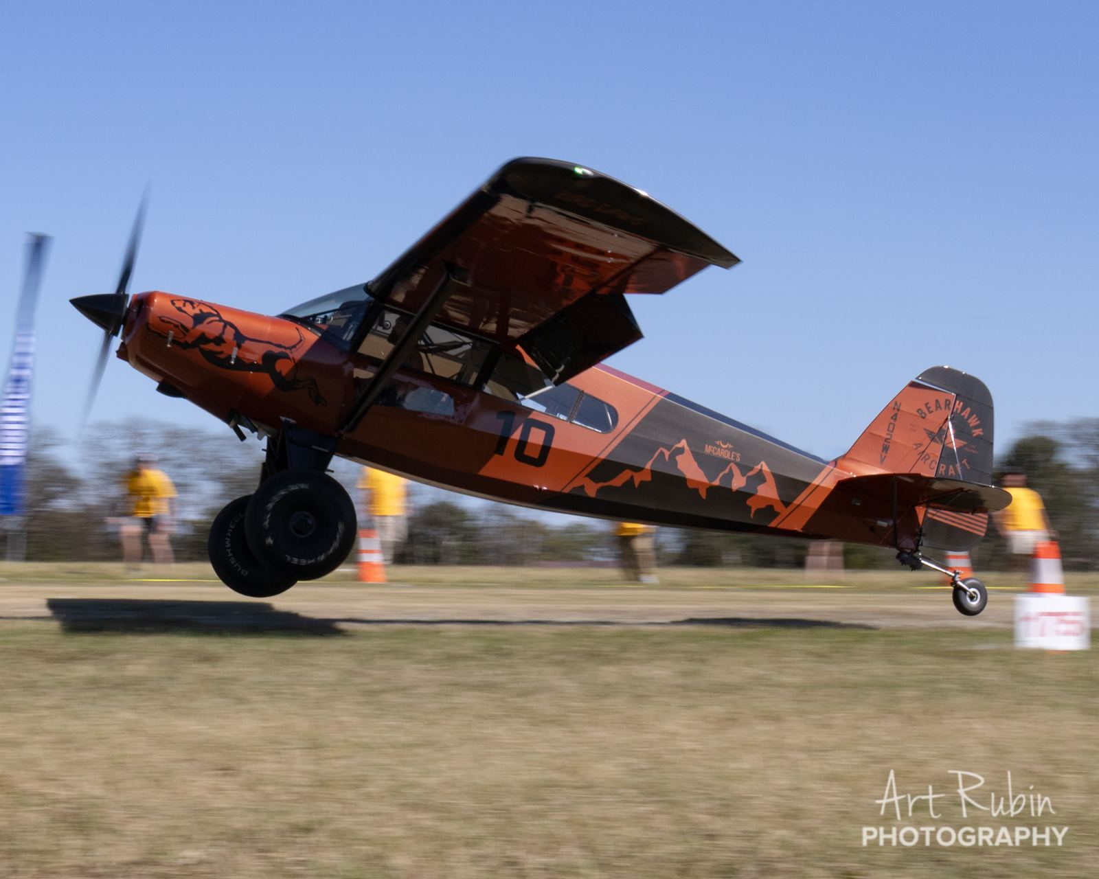 Backcountry plane touching down on its mains
