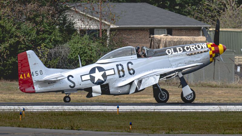 P-51 Mustang 'Old Crow' lifting off from the paved runway