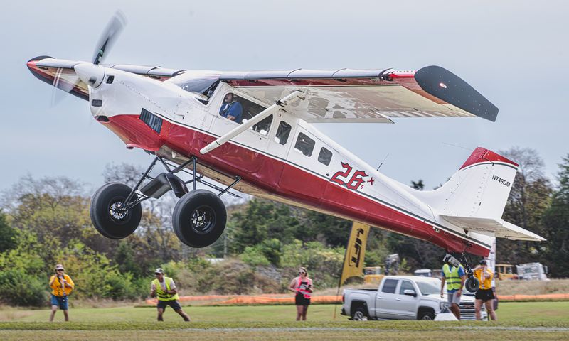 Race 260 · Luke Strandlund · Murphy SuperRebel N749DM climbing over the crowd line