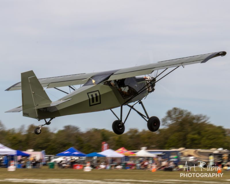 Race 11 · David Kerley · Just Highlander N11HL, the Sport Class winner, airborne over the course