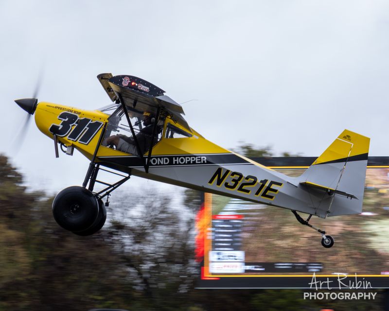 Race 311 · Tom Pond · Just SuperSTOL N321E climbing past the LED wall