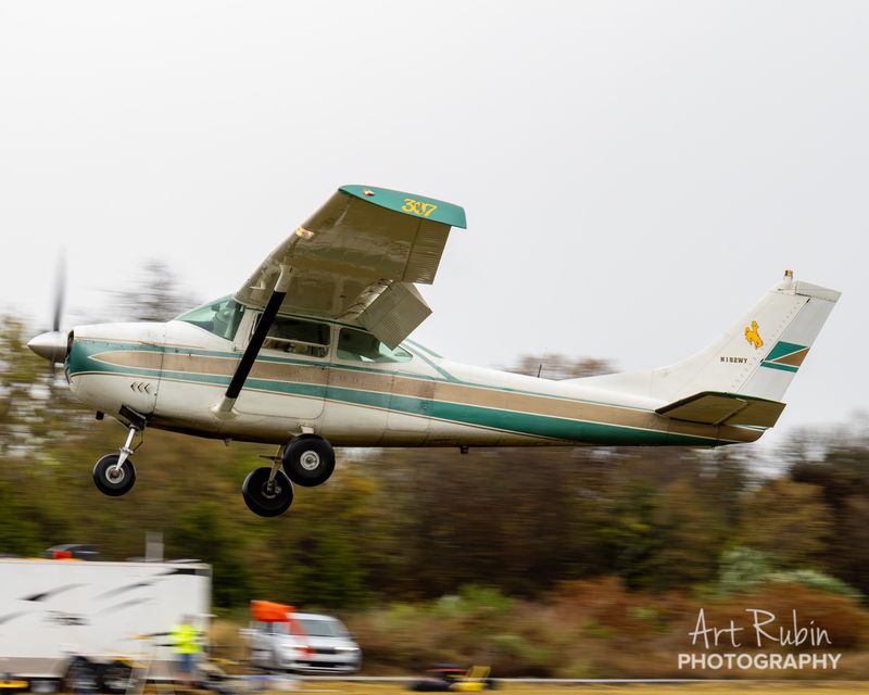 Race 307 · John Douglas · Cessna 182 N182WY lifting off in the rain