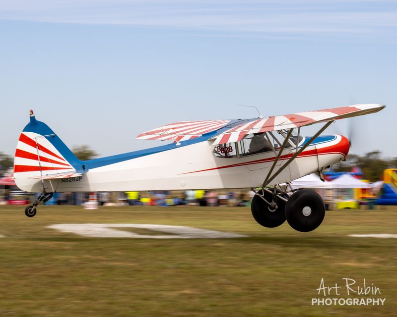 Race 828 · Foster Carney · Piper PA-18 N828JP lifting off