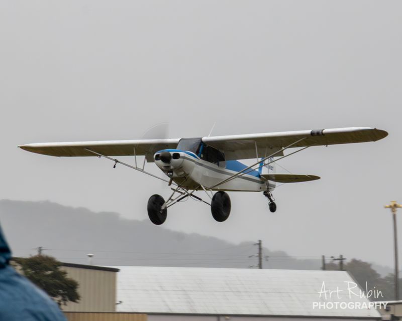 Race 67 · David Warren · Piper PA-18-150 N51627 on final in the rain