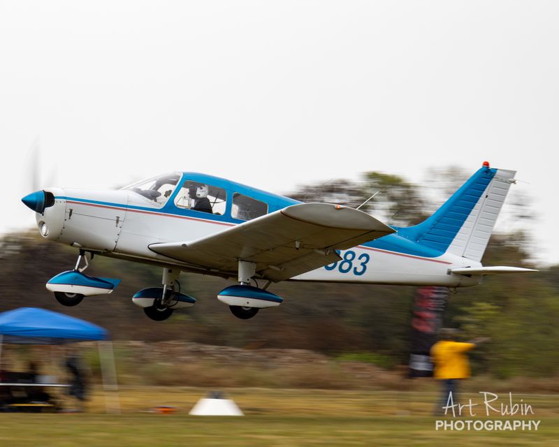 Kyle LaMontagne · Piper PA-28-140 Cherokee N41383 climbing out in the rain
