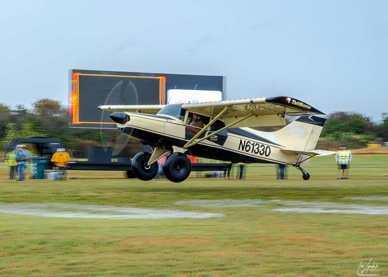 Race 45 · Rick Holman · Maule MX-7 N61330 touches down in front of the LED wall on competition day