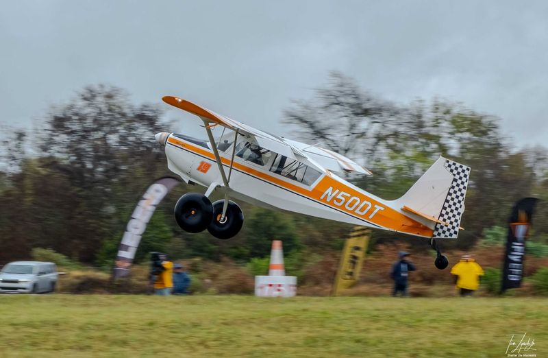 Race 19 · Jeffrey Harrell · Champion Scout N50DT climbing out over the cones